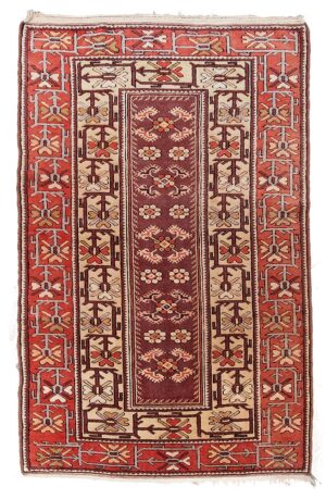 Tappeto Mogan antico di inizio 900 misura 205x124 cm in lana a rilievo con campo melanzana e bordura geometrica corallo